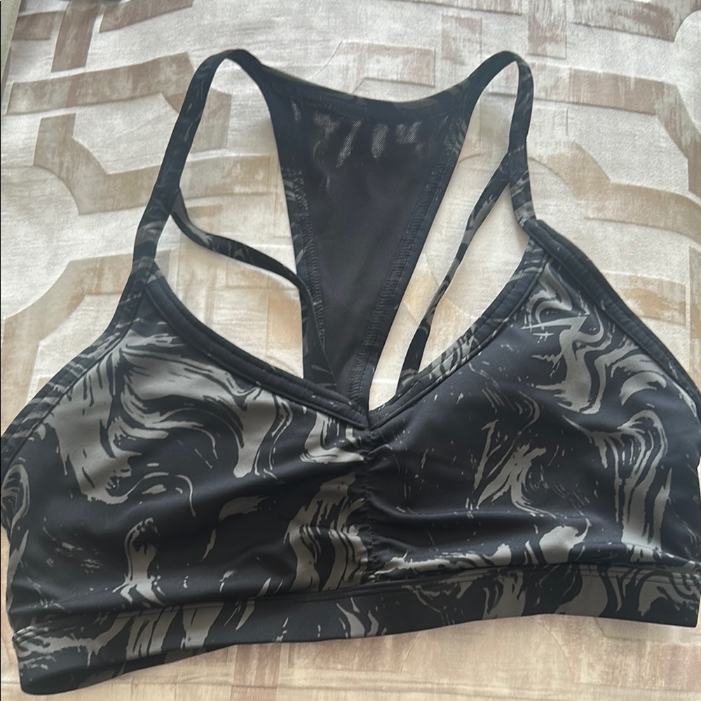 Gymshark Black and Gray Sports Bra with Racerback Design